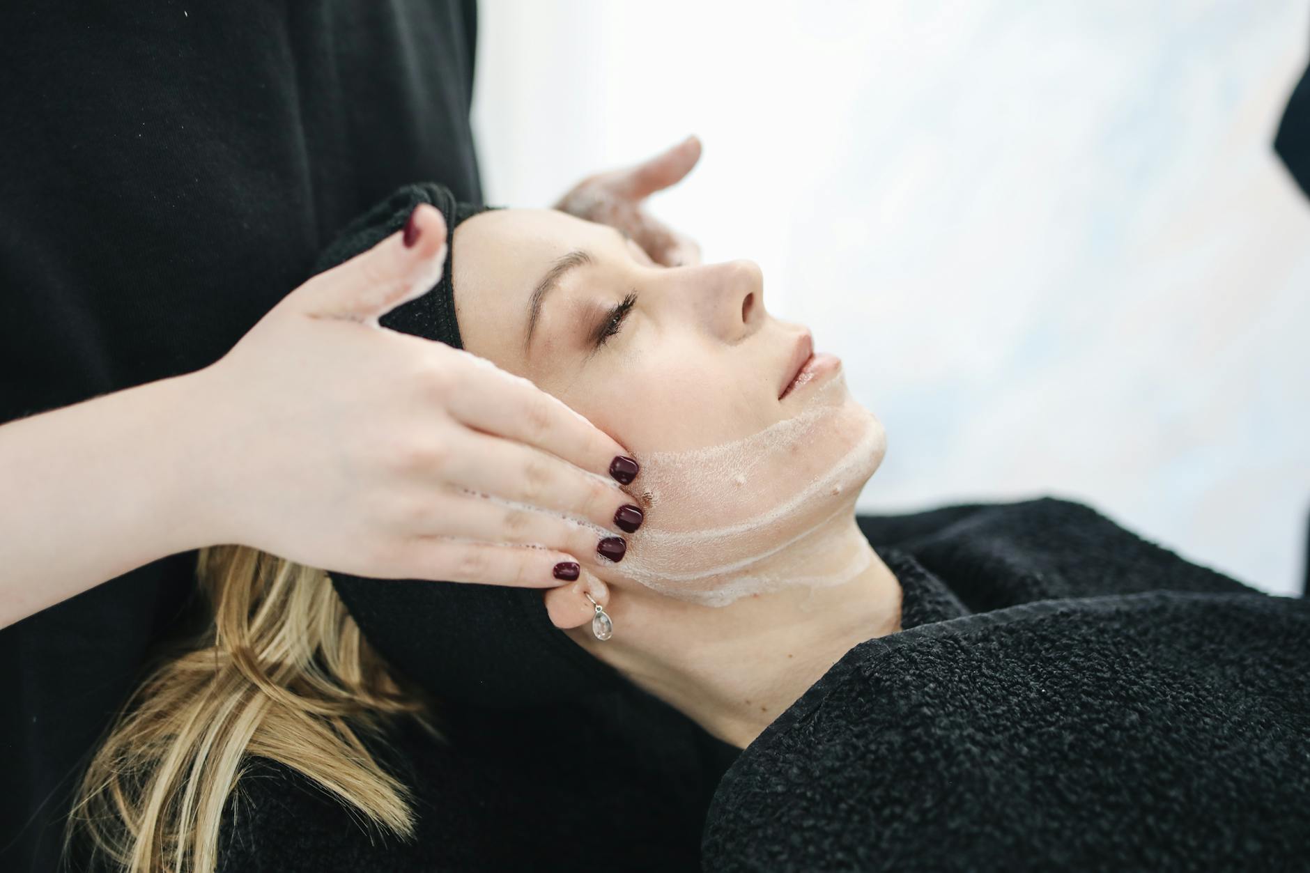 woman having facial care